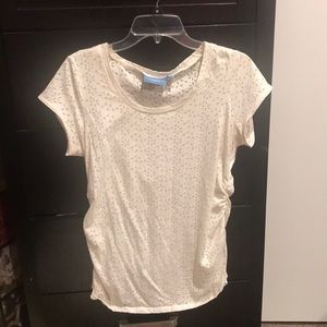 Short sleeved light fabric blouse.